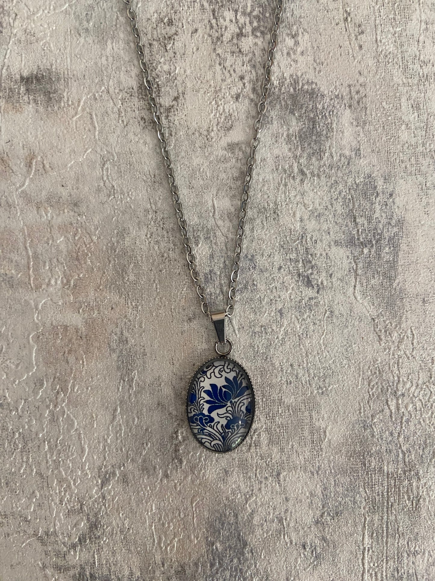 Blue/ White Floral Pattern Oval 1.8x2cm Silver Pendant Necklace (45cm chain)