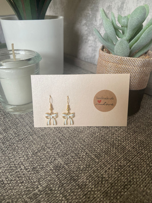 White Bow Gold Trimmed Gold Earrings
